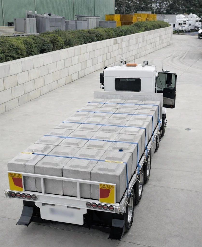 Symon Concrete Products truck loaded with precast concrete blocks ready for NSW delivery
